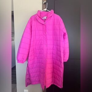 Hot pink, long puffer winter coat.  Full zipper with snap buttons.  Size 1XL.
